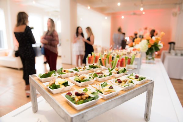Healthy organic gluten-free delicious green snacks salads on catering table during corporate event party
